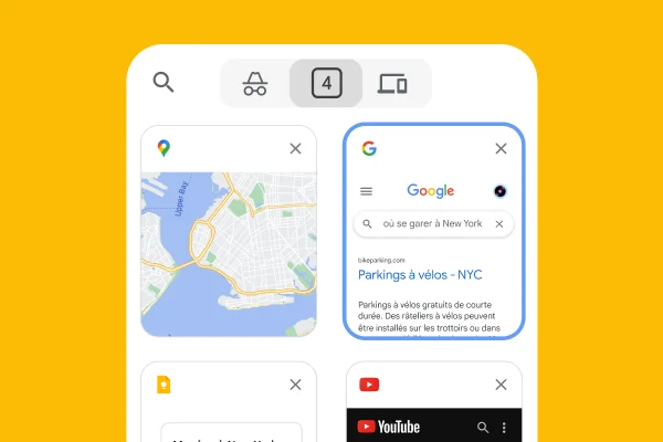 Un navigateur mobile charge les onglets du navigateur d'un ordinateur, y compris Google Maps et les informations de stationnement à New York.